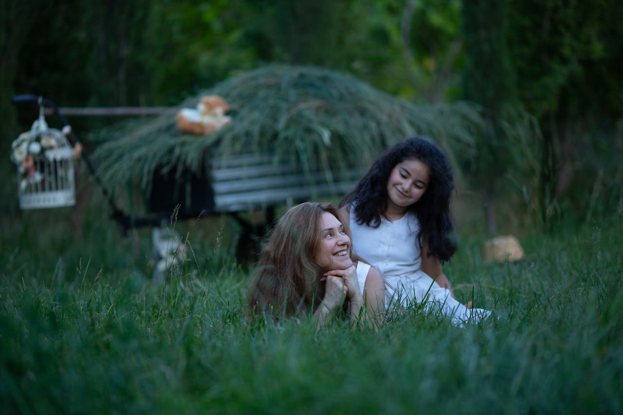 Mother and Daughter Enjoying a Relaxing Day Outdoors