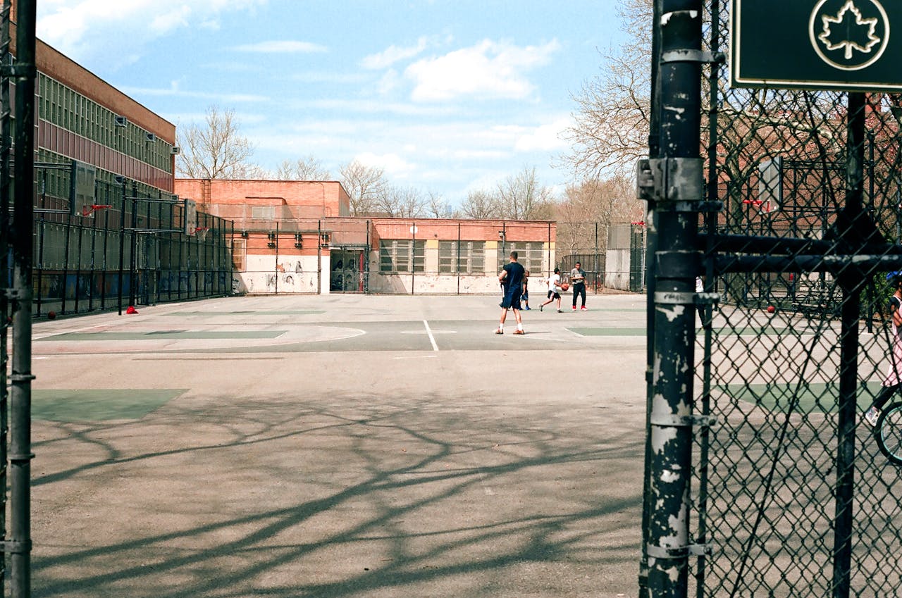 A few kids playing in school yard