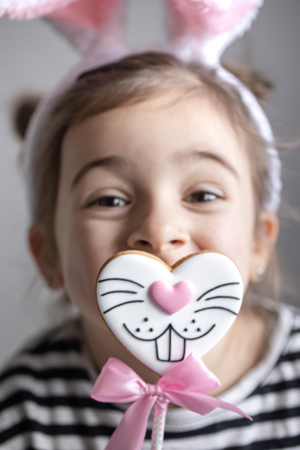 girl with bunny heart cookie