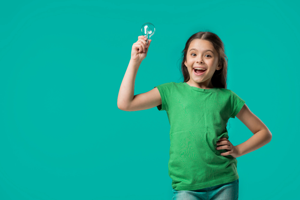 https://www.freepik.com/free-photo/adorable-junior-with-lamp-studio_2406674.htm#fromView=search&page=1&position=4&uuid=7e4dcb45-53f0-4e0d-a025-cabf321340c7&query=green+kid girl in green with lightbulb