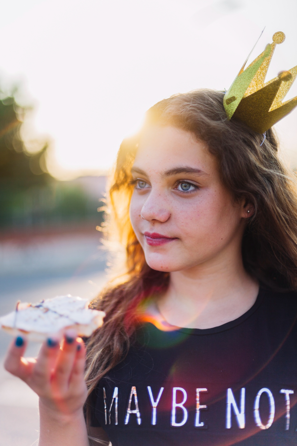 Young woman wearing shirt that says maybe not