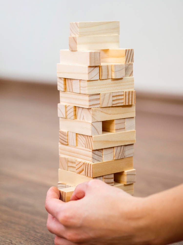Kid playing Jenga