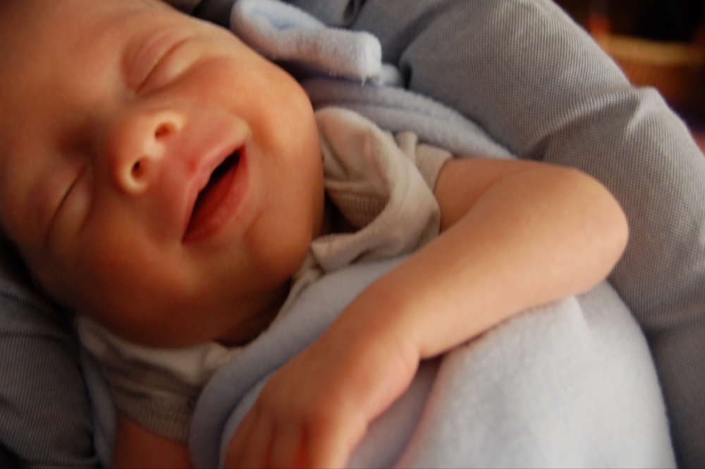 Baby smiling, milk drunk