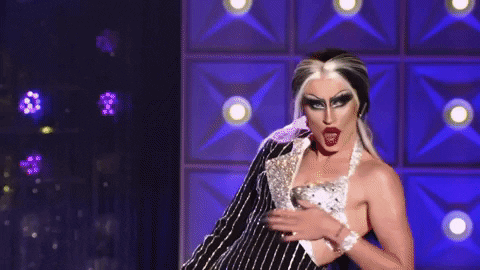 Contestant from RuPaul's drag race flips hair sassily