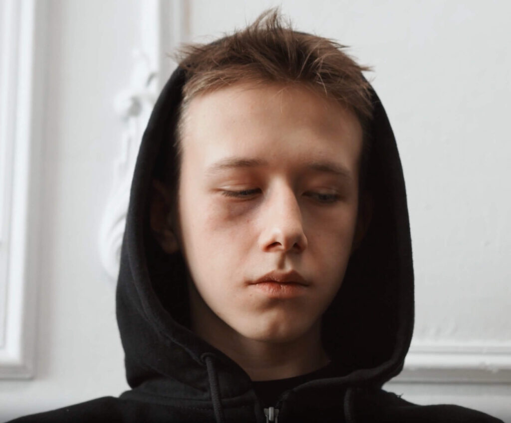 Young man in black hoodie