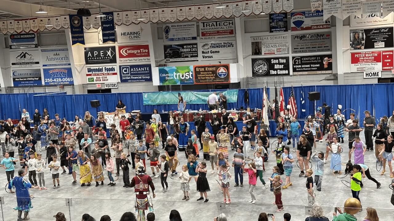 Students attend a youth powwow as part of Indigenous learning programming in Nelson, B.C.. Staff say trips like this may be harder to organize under the new staffing model in School District 8.